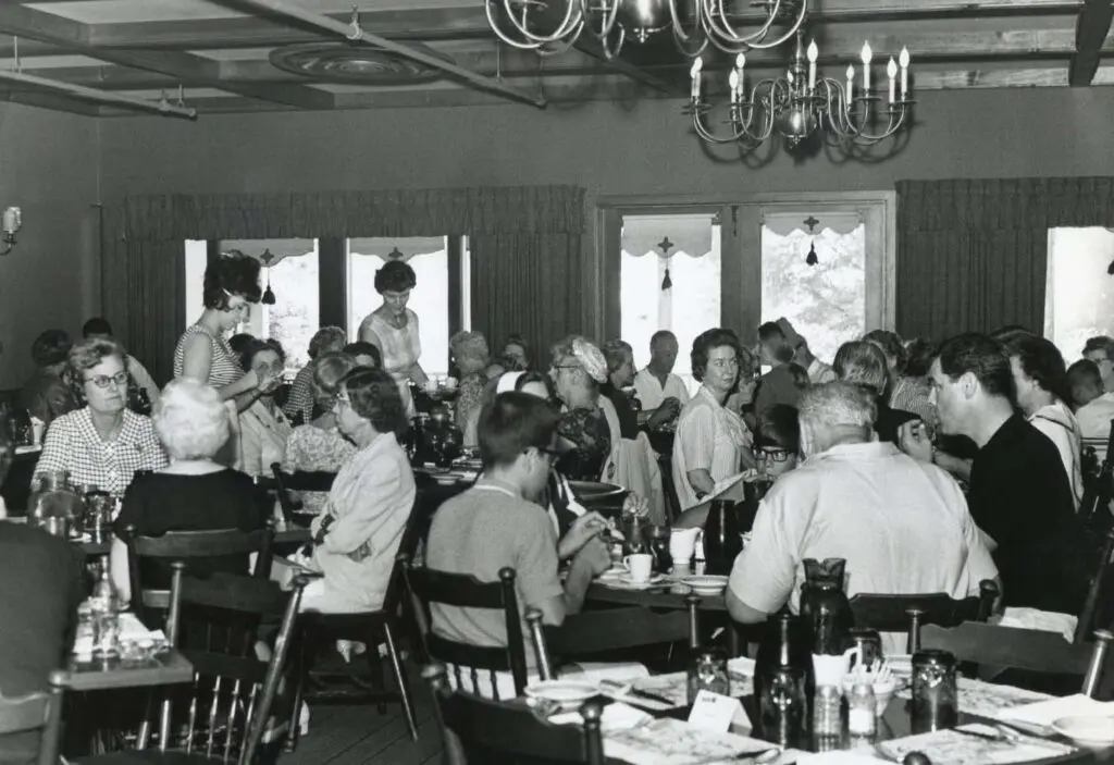 Historic dining room filled with guests at the Stagecoach Inn in Salado, Texas.