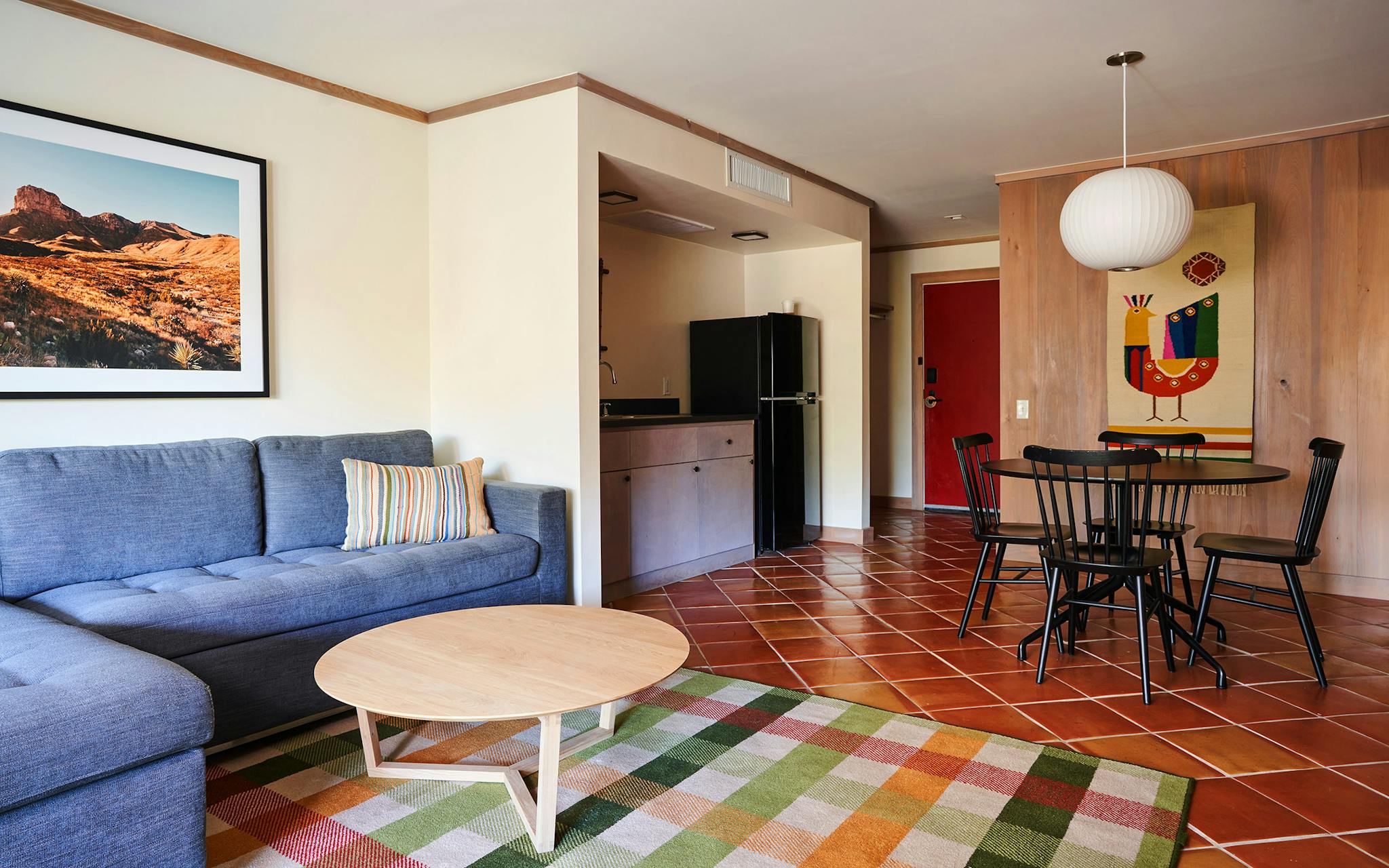 Modern and cozy interior of the second room in a suite at Stagecoach Inn in Salado, Texas.