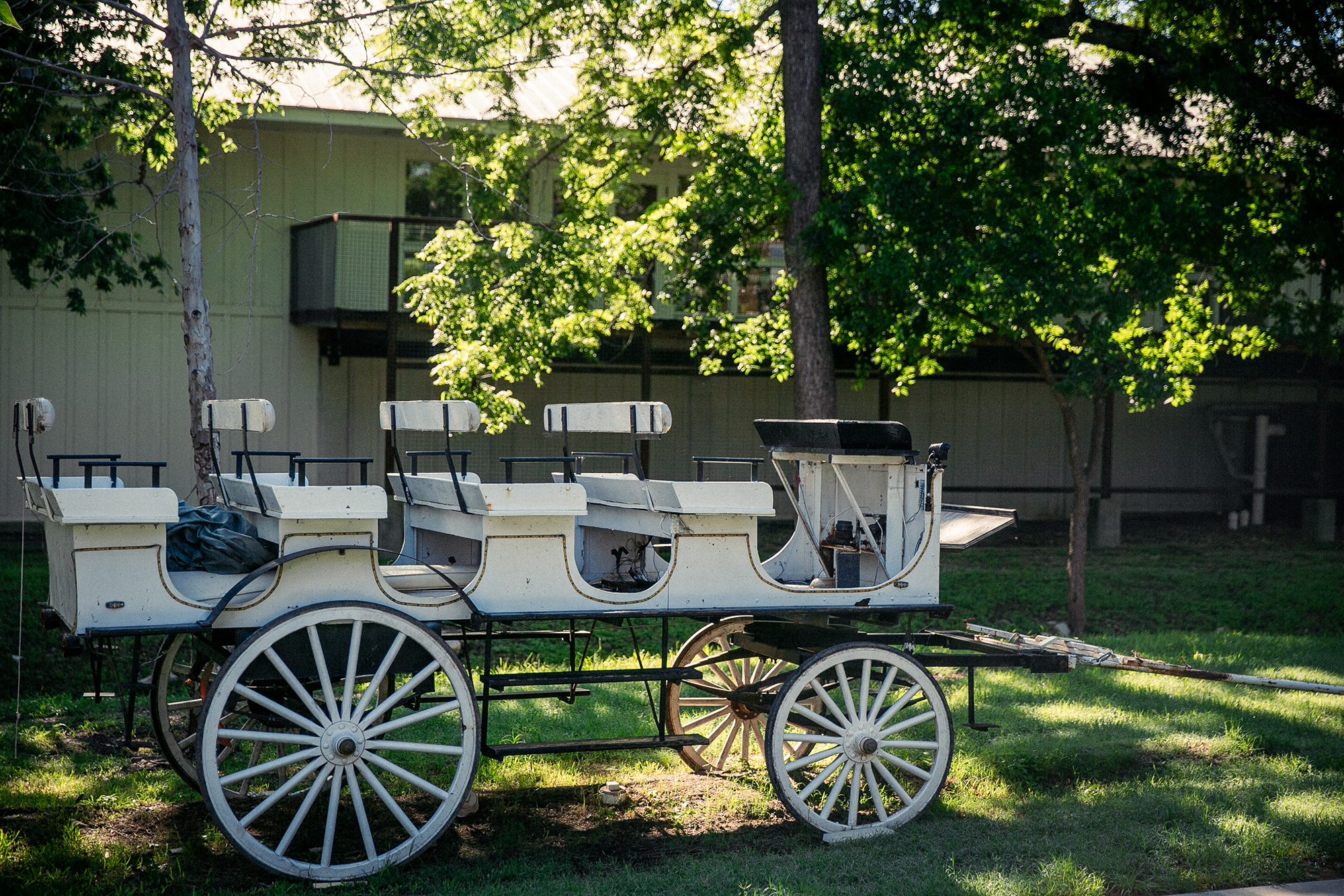 Historic white stagecoach wagon on display at the Stagecoach Inn in Salado, Texas.
